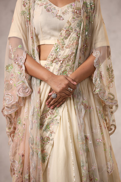 OFF WHITE CAPE STYLE EMBROIDERED LEHENGA SET