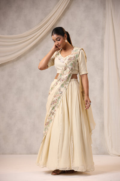 OFF WHITE CAPE STYLE EMBROIDERED LEHENGA SET